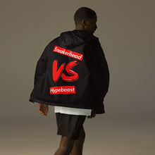 Load image into Gallery viewer, Exclusive &quot;Sneakerhead vs Hypebeast&quot; lightweight zip up windbreaker - SNEAKERHEADS CLOTHING LINE
